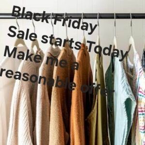 Assorted Colorful Clothing on Hangers